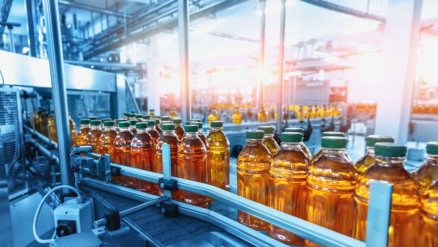 Industrial production line, Conveyor belt with juice in bottles