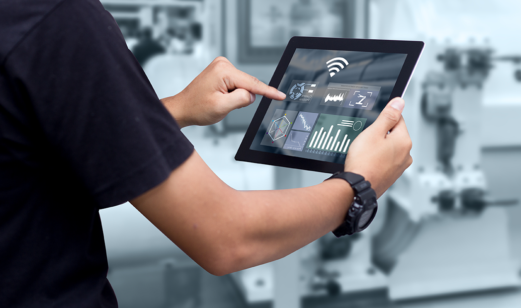 hands holding a tablet